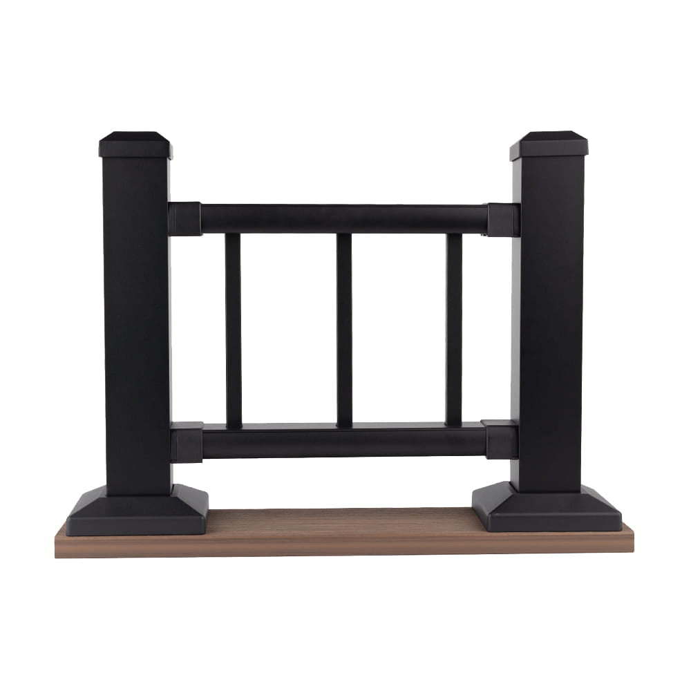 Black metal gate with wooden base on a white background